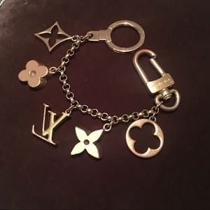 - Louis Vuitton bag charm or  bracelet